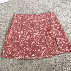 red patterned skirt with slit
